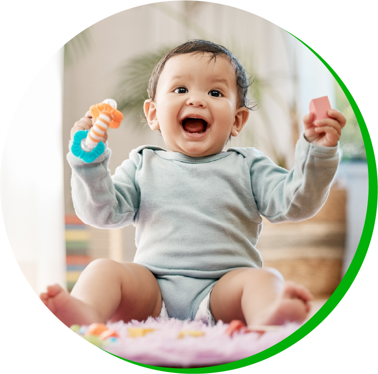 a close up of a child holding a baby